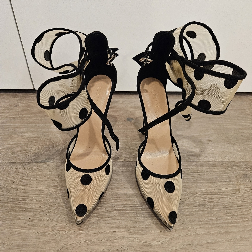 Elegant Cream and Black Pointed Toe Heels with Lace-Up Design